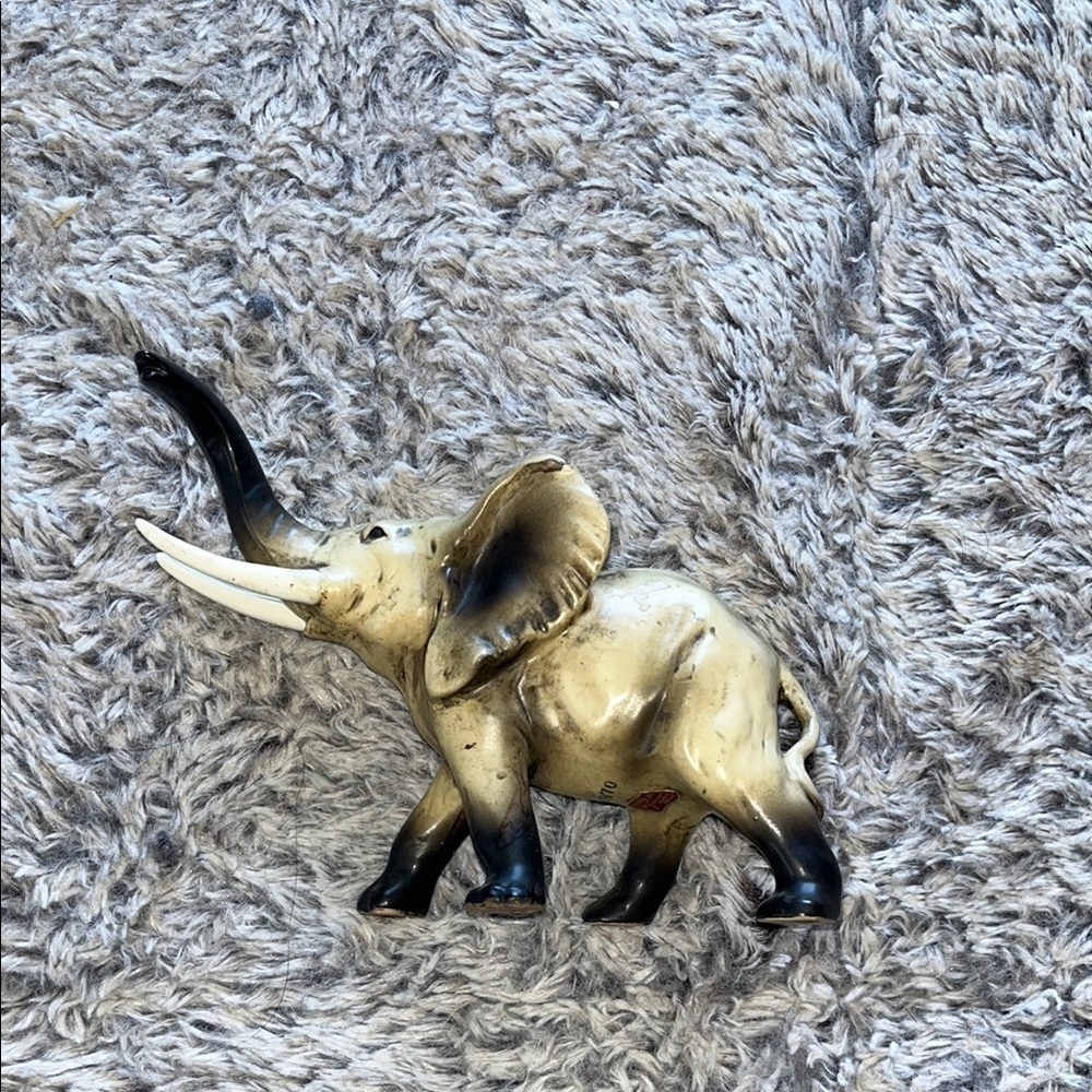 Vintage Lefton H2675 porcelain decorative lucky elephant figurine.